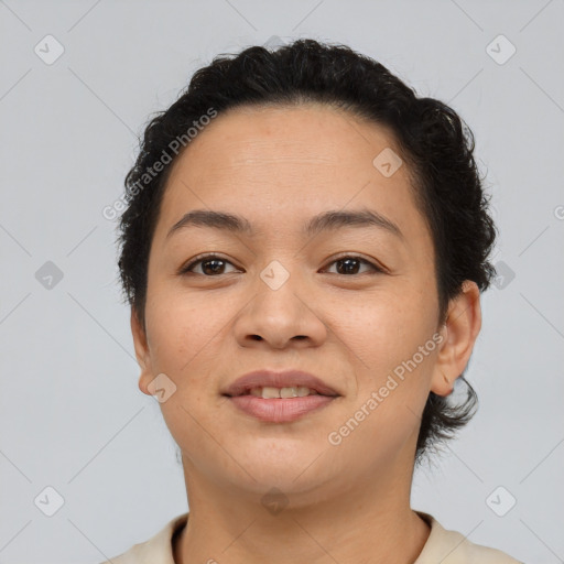 Joyful asian young-adult female with short  brown hair and brown eyes