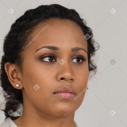 Neutral black young-adult female with medium  brown hair and brown eyes