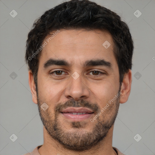 Joyful white young-adult male with short  black hair and brown eyes