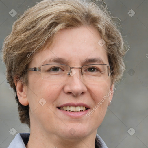 Joyful white adult female with short  brown hair and grey eyes