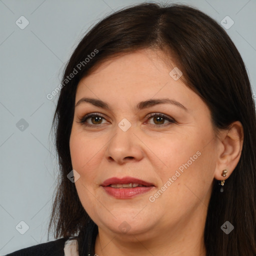 Joyful white adult female with medium  brown hair and brown eyes