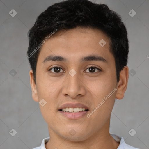 Joyful latino young-adult male with short  black hair and brown eyes