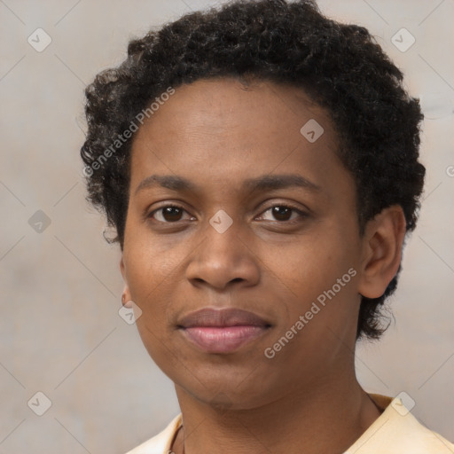 Joyful black young-adult female with short  black hair and brown eyes