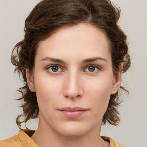 Neutral white young-adult female with medium  brown hair and grey eyes