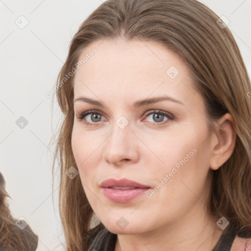 Neutral white young-adult female with long  brown hair and grey eyes