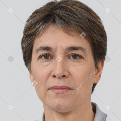 Joyful white adult female with short  brown hair and brown eyes