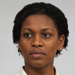 Neutral black young-adult female with short  black hair and brown eyes