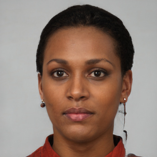 Neutral black young-adult female with short  black hair and brown eyes