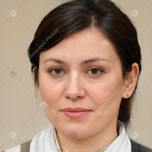 Joyful white adult female with medium  brown hair and brown eyes