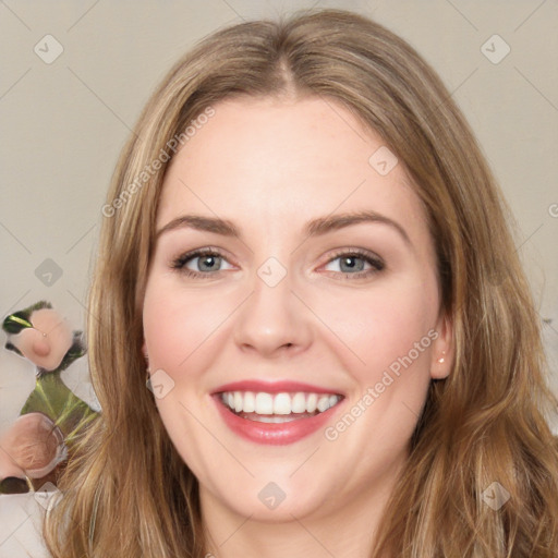 Joyful white young-adult female with medium  brown hair and green eyes