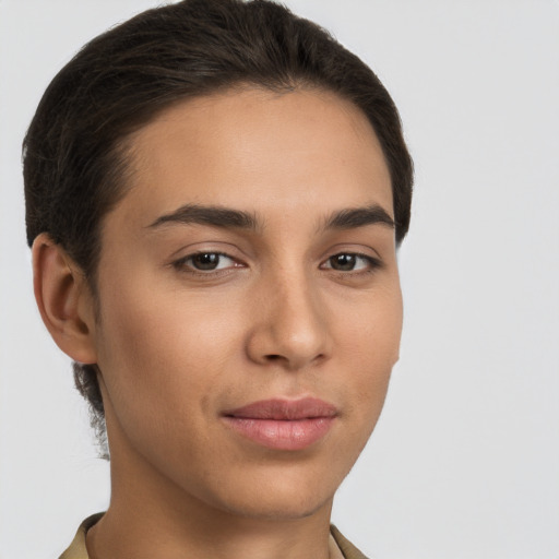 Joyful white young-adult female with short  brown hair and brown eyes