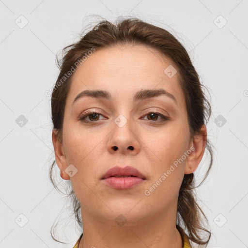 Neutral white young-adult female with medium  brown hair and brown eyes