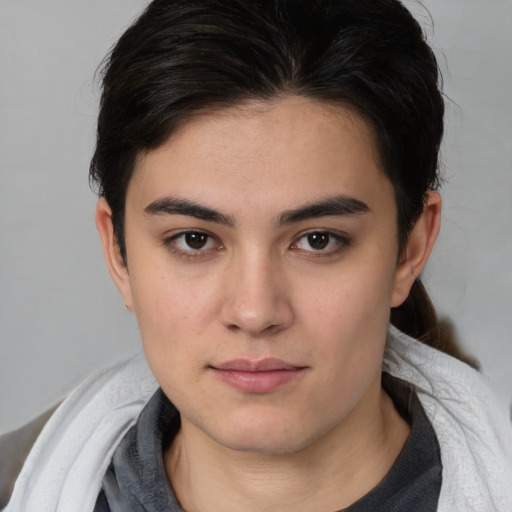 Joyful white young-adult female with medium  brown hair and brown eyes
