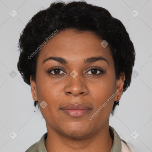 Joyful black young-adult female with short  brown hair and brown eyes