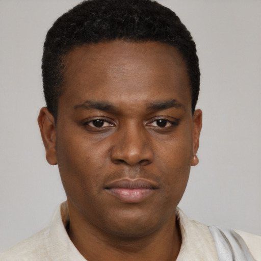 Neutral black young-adult male with short  brown hair and brown eyes
