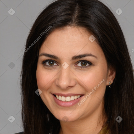 Joyful white young-adult female with long  brown hair and brown eyes