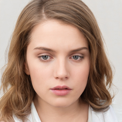 Neutral white young-adult female with medium  brown hair and brown eyes