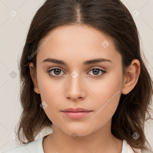 Neutral white young-adult female with long  brown hair and brown eyes