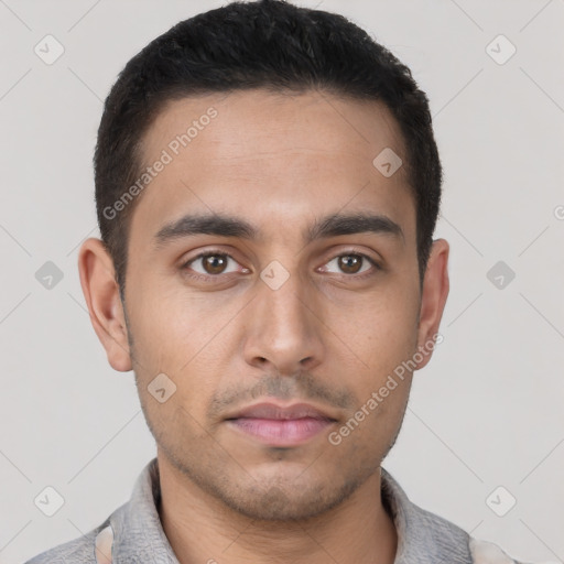 Neutral latino young-adult male with short  black hair and brown eyes