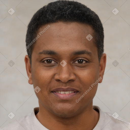 Joyful black young-adult male with short  black hair and brown eyes