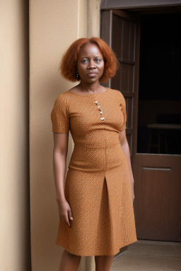 Togolese middle-aged female with  ginger hair