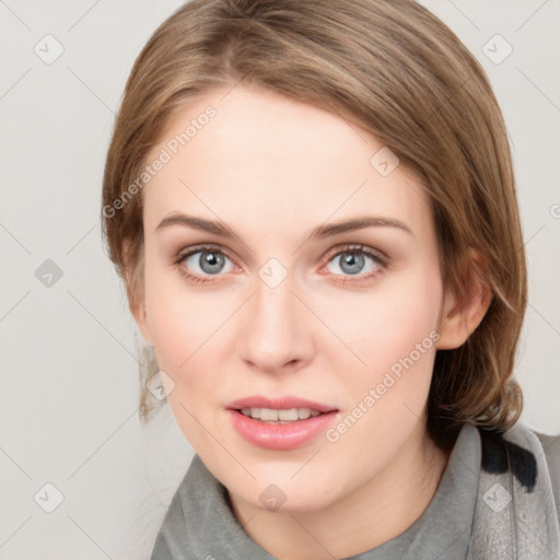 Joyful white young-adult female with medium  brown hair and blue eyes