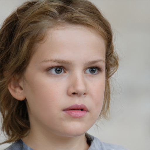 Neutral white child female with medium  brown hair and brown eyes