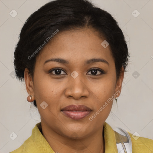 Joyful black young-adult female with short  brown hair and brown eyes