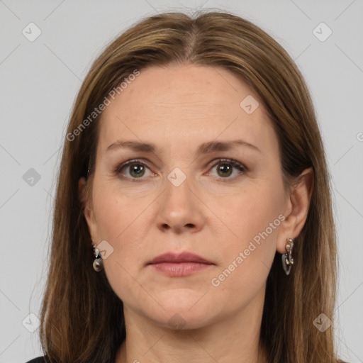 Joyful white adult female with medium  brown hair and grey eyes