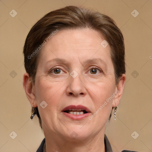 Joyful white adult female with medium  brown hair and grey eyes