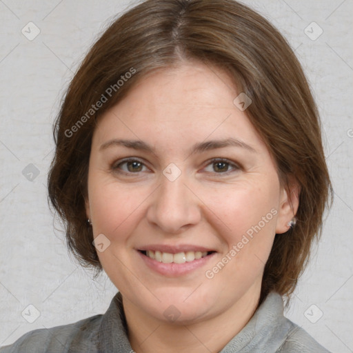 Joyful white adult female with medium  brown hair and brown eyes