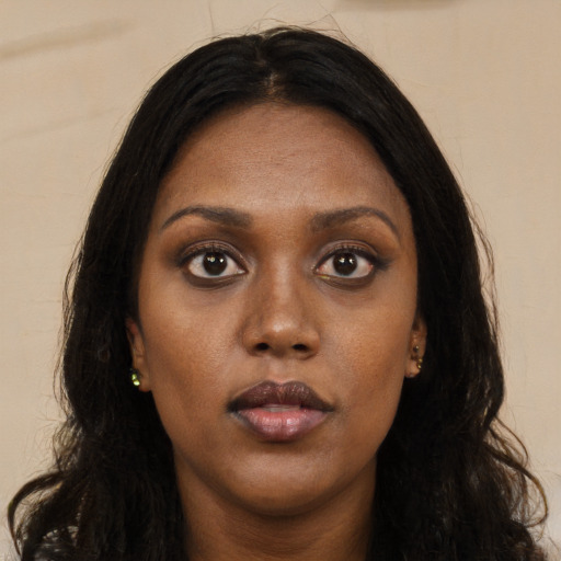 Neutral black young-adult female with long  brown hair and brown eyes