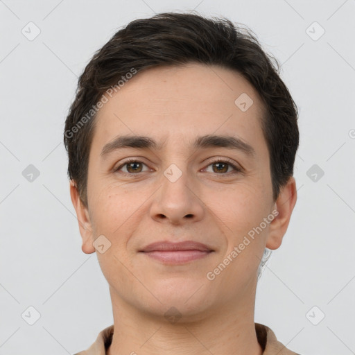 Joyful white young-adult male with short  brown hair and brown eyes