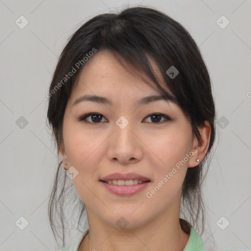 Joyful asian young-adult female with medium  brown hair and brown eyes