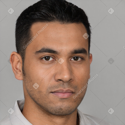 Neutral latino young-adult male with short  black hair and brown eyes