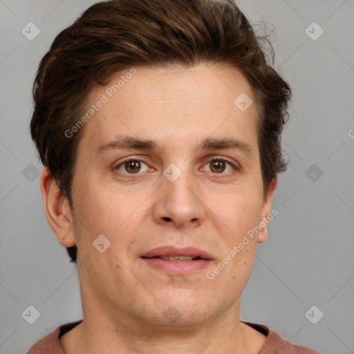 Joyful white adult male with short  brown hair and grey eyes