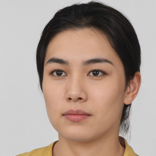 Neutral asian young-adult female with medium  black hair and brown eyes