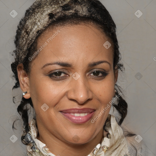 Joyful black adult female with medium  brown hair and brown eyes