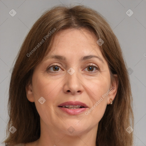 Joyful white adult female with medium  brown hair and brown eyes