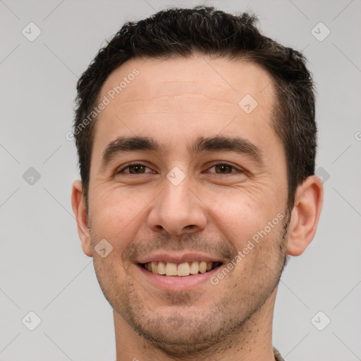 Joyful white young-adult male with short  brown hair and brown eyes