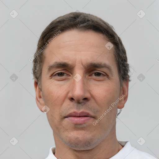 Neutral white adult male with short  brown hair and brown eyes