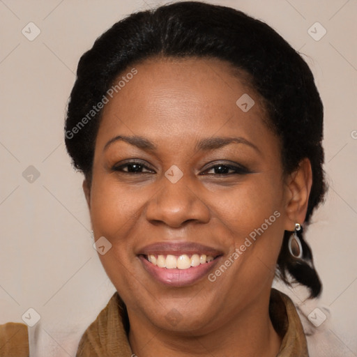 Joyful latino adult female with medium  brown hair and brown eyes