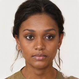 Neutral black young-adult female with short  brown hair and brown eyes