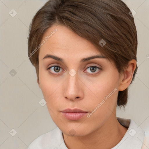 Neutral white young-adult female with short  brown hair and brown eyes