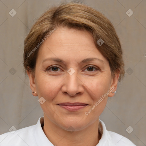 Joyful white adult female with short  brown hair and brown eyes