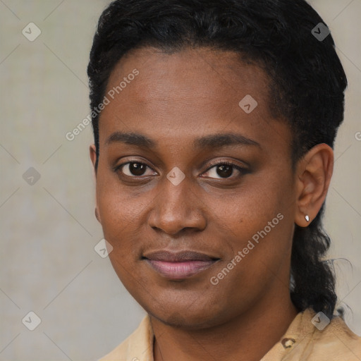 Joyful black young-adult female with short  black hair and brown eyes