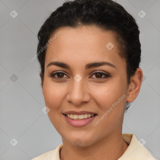 Joyful latino young-adult female with short  brown hair and brown eyes