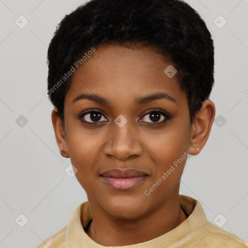 Joyful black young-adult female with short  black hair and brown eyes