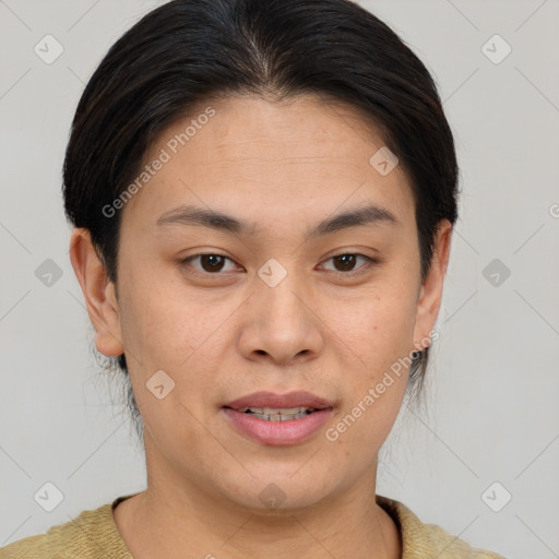 Joyful asian young-adult female with short  brown hair and brown eyes