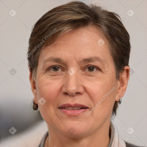 Joyful white adult female with short  brown hair and brown eyes